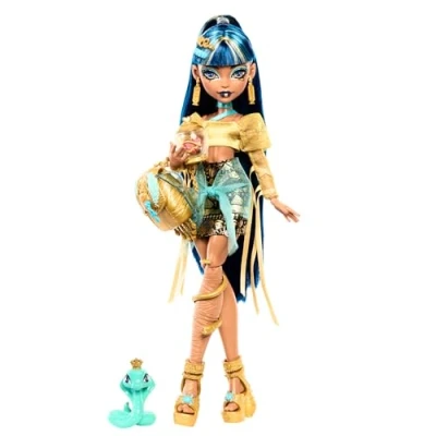 Image de Monster High Cleo De Nile HXH74 Poupée avec chemisier doré et jupe superposée, comprend une hissette Cobra des accessoires comme un sac à dos, collation parchemin