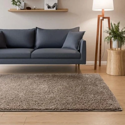 Afbeelding van Interiyou Sofia hoogpolig tapijt 80x150 cm taupe pluizig effen wasbaar antislip zacht