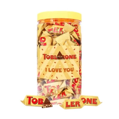 Afbeelding van Toblerone Mini melkchocolade met nougat, amandel en honing 500g