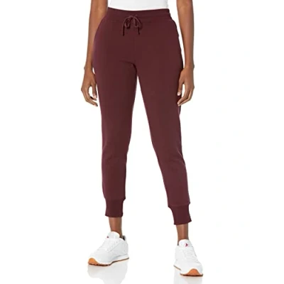 Image de Amazon Essentials Pantalon de jogging en polaire pour femme (disponible grande taille), bordeaux, taille TG
