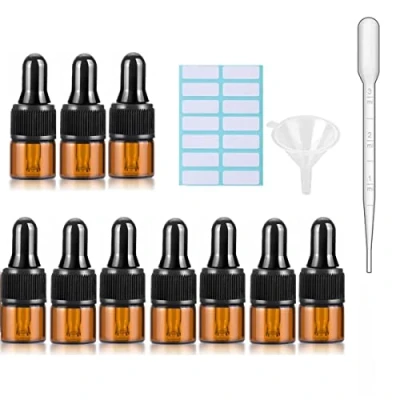 Afbeelding van 10 stuks amberkleurige glazen druppelflessen met zwarte doppen, gemeten pipet, trechter en etiketten; 1 ml voor hervulbare etherische oliepijpetten