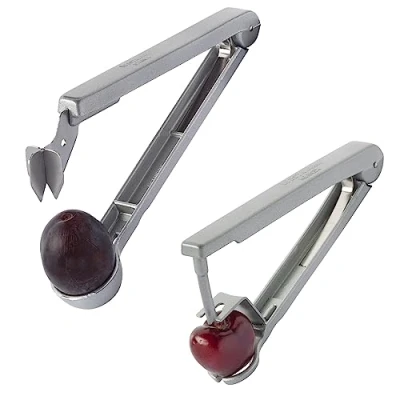 Afbeelding van 1 kersen + pruimenontsteker voor keukenkant en klaar ontpte vruchten, aluminium, voedselveilig gecoat, roestvrij stalen lemmet, Kernex Steinex, zilver, 401022E6