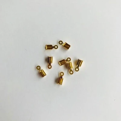 Afbeelding van Koordsluiting klein 5x3mm goudkleur 8st 11808 1562