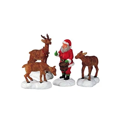Afbeelding van Santa feeds reindeer LEMAX
