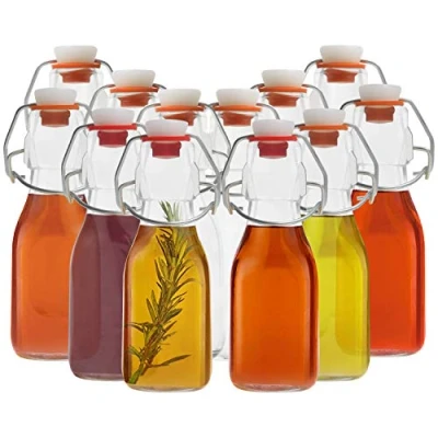 Afbeelding van Kurtzy Set van 12 lege glazen flessen 100 ml met luchtdichte mechanische sluiting, transparante bierfles voor dranken, olie, azijn, kombucha en water