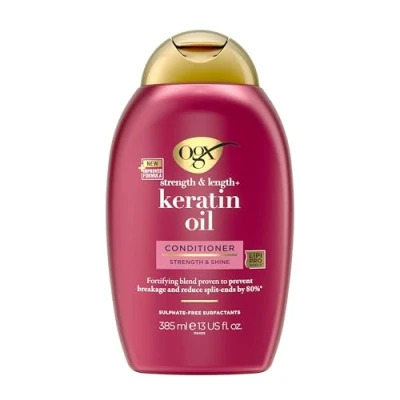 Image de OGX, Après shampooing Keratin Oil (flacon de 385 ml) Soin capillaire fortifiant pour cheveux cassants revitalisant à l&#039;huile kératine