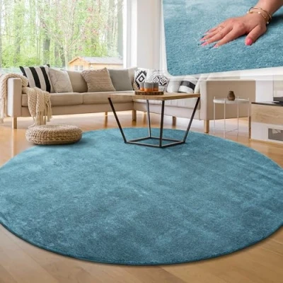 Afbeelding van Paco Home Vloerkleed voor de woonkamer, effen, wasbaar, korte en zachte pool rond: 120 cm, turquoise