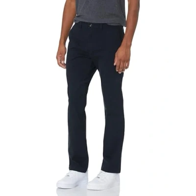 Image de Amazon Essentials Pantalon chino stretch décontracté, coupe athlétique (grandes tailles disponibles) Men&#039;s, Noir, 31W / 29L