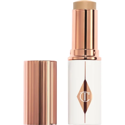 Afbeelding van Charlotte Tilbury Unreal Skin Sheer Glow Tint Hydrating Foundation Stick 5 Medium 9 Gram