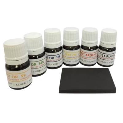Afbeelding van PROMO: KLAAR KIT 6 FLACONS GOUDEN TESTER 9 14 18 24K ZILVEREN TEST + PLATINE NATUURLIJKE TOETSTESTEN 50 x 40 mm EXPERTISE GIDS AANGEBODEN (GOLD STONE TEST)