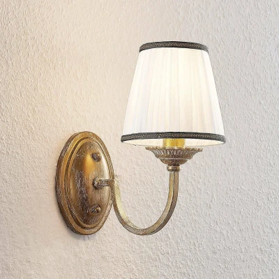 Afbeelding van Lindby Wandlamp 1licht textiel, metaal H: 27 cm E14 crème, messing