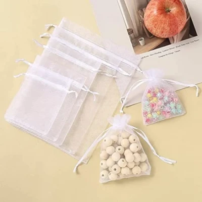 Afbeelding van HERZWILD Organza kerstzakjes, 100 stuks, wit, klein (10 x 15)