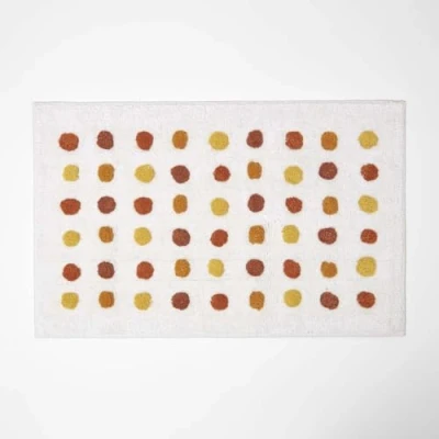 Afbeelding van Homescapes gestippelde badmat, 50 x 80 cm badmat stippen mosterdgeel wit
