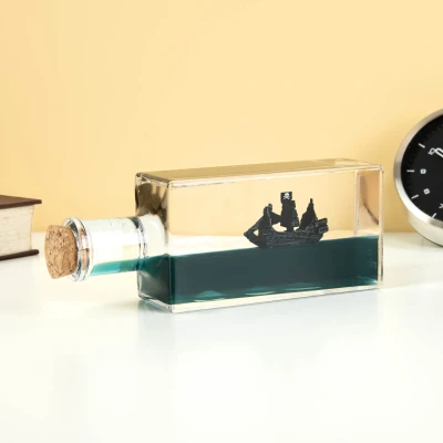 Afbeelding van MikaMax Unsinkable Pirateship Onzinkbaar Piratenschip decoratie Bureau Model Schip in Fles 17 x 4,2 6,2 cm
