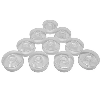 Afbeelding van Set van 10 plastic spoelen voor naaimachines Singer (Apollo Greifer) Capri/Symphonie/Starlet/Merritt/Ladystar/Elegance/Panoramicm/Concerto en Jeans