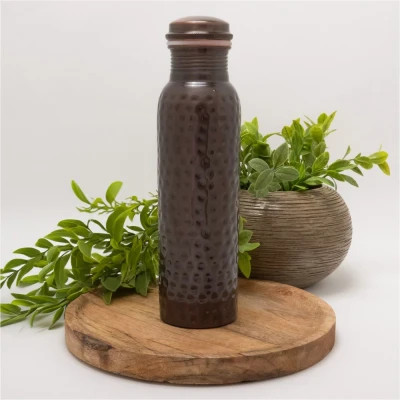 Afbeelding van Puur koperen waterfles gehamerd antique ± 950 ml (zware uitvoering)