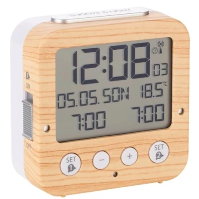 Afbeelding van TFA Dostmann Bingo 60.2528 Radiogestuurde wekker met automatische achtergrondverlichting, datum, temperatuurweergave en twee alarmen, 81 x 33 mm, houtlook, witte toetsen