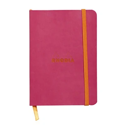 Afbeelding van RHODIA 117312C Notitieboek, zacht, framboos, A6, gelinieerd, 144 pagina&#039;s, licht papier, ivoorkleurig, 90 g/m², bladwijzer, elastische sluiting, kunstlederen omslag, collectie Rhodiarama