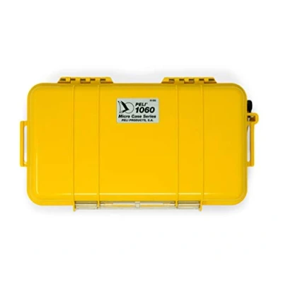Afbeelding van PELI 1060 Micro beschermhoes, bescherming voor smartphone en kleine uitrusting bij outdoor avonturen, IP67 waterdicht, 3 l capaciteit, gemaakt in de VS, geel/zwarte voering