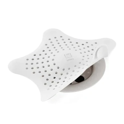 Image de UMBRA Starfish. Filtre à bonde de douche et bain Coloris blanc. Dimension 16.5x16.5x1.3cm.