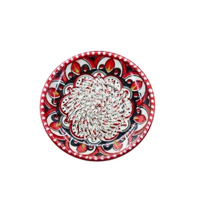 Afbeelding van Kaladia Keramisch raspbord / keramische schaaf Ideaal voor gember, Parmezaanse kaas enz. In rood, wit en zwart met Gazania motief Diameter 12 cm Handgemaakt de hand beschilderd