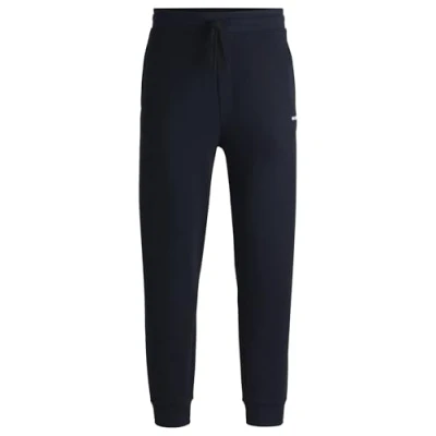 Image de HUGO Dayote232 Pantalon de jogging en coton avec logo imprimé, Dark Blue405, L