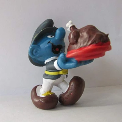 Afbeelding van Kerstsmurf met kalkoen Bank holiday smurf Schleich 5,5 cm De Smurfen