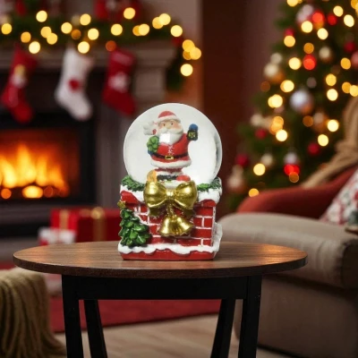 Afbeelding van Sneeuwbal Kerstman met gouden strik Betoverende kerstdecoratie