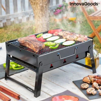 Afbeelding van Opvouwbare draagbare barbecue voor gebruik met houtskool BearBQ InnovaGoods
