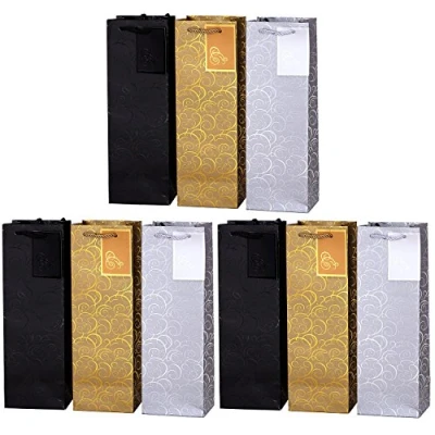 Afbeelding van Set van 9 cadeautasjes gouden zilveren zwarte flessentasjes voor wijn en ook mousserende of champagne 36x12x10 cm