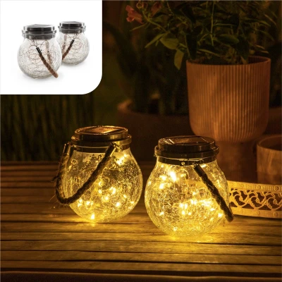 Afbeelding van Gadgy Solar Lantaarn Craquelé Glas met 20 fairy lights Tafellamp Set van 2 tuinverlichting op zonneenergie Led buitenverlichting dag/nacht sensor Hanglamp Tuinlantaarn 13.5 x Ø12CM