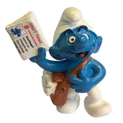 Afbeelding van Schleich speelfiguur smurf als krantenbezorger De Smurfen 20458 6 cm