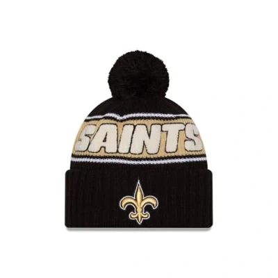 Afbeelding van New Era Orleans Saints NFL 2024 Sideline Sport Knit Zwart Pompon Muts, #34368