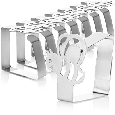 Afbeelding van COM FOUR® 8x premium tafelkleedclips van roestvrij staal, tafelclips voor binnen en buiten, met decor op de (08 stuks / hommel)