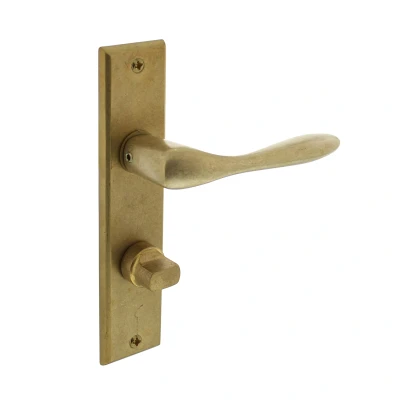Afbeelding van Intersteel Deurkruk Banaan met schild 181x41x7mm WC63/8mm messing getrommeld