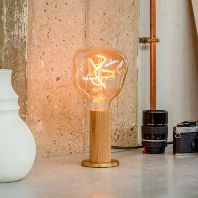 Afbeelding van Tala tafellamp Knuckle, lamp van helder glas, eiken