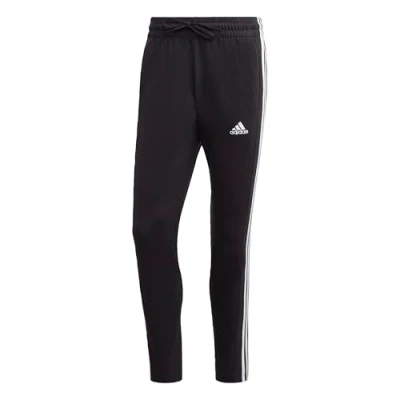 Afbeelding van adidas Sportswear Essentials Single Jersey Tapered Open Hem 3 Stripes Broek Heren Zwart XS