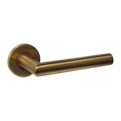 Afbeelding van Intersteel Deurkruk Q 01 op rozet verdekt ø52x6mm PVD messing mat