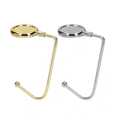 Afbeelding van kwmobile Tassenhaken voor tafel Set van 2 draagbare tashangers Tassenhangers of kast In goud / zilver