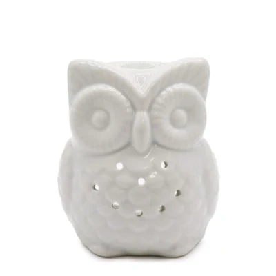 Afbeelding van klassieke witte oliebrander, grote oliebrander in de vorm van een uil