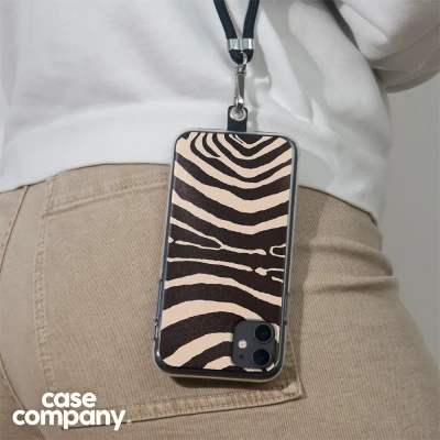 Afbeelding van Case Company® hoesje met Koord geschikt voor Xiaomi 13 Arizona Zebra Telefoonhoesje Zwart Bescherming aan alle Kanten en Over de Schermrand