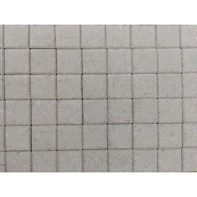 Afbeelding van Betonstraatsteen 10,5x10,5x8 cm half grijs