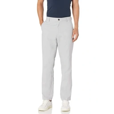 Image de Amazon Essentials Pantalon chino infroissable à devant plat pour homme (disponible en grande taille large), gris clair, 73,7 x 81,3 cm (l L)