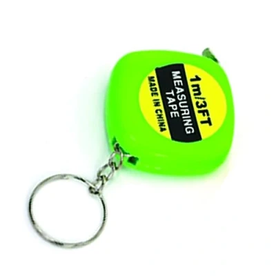 Afbeelding van PARENCE. Mini meetlint 1 m, 3FT couturier, kleermaker/kleine meter voor de petanque (1 meter) flexibele sleutelhanger, zakformaat willekeurige kleur (blauw, groen, oranje, geel ...)