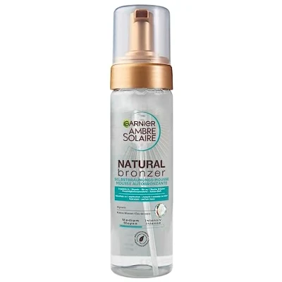 Image de Garnier Ambre Solaire Mousse Auto Bronzante Bronzant pour le Corps et Visage avec Eau de Coco Hydratante 150 ML