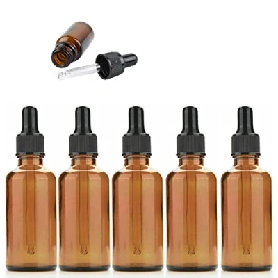 Afbeelding van Set van 5 amberkleurige glazen druppelflessen met zwarte doppen, 50 ml, navulbare voor etherische olie