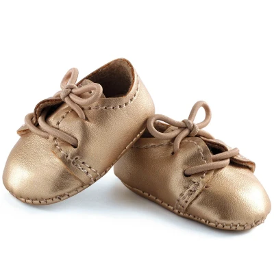 Afbeelding van Djeco poppenschoenen pomea goud 32 cm