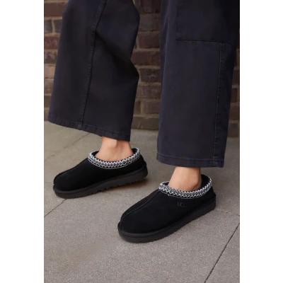 Afbeelding van UGG dames Tasman slip on van schapensuède met schapenvacht in de kleur Zwart, maat: 40