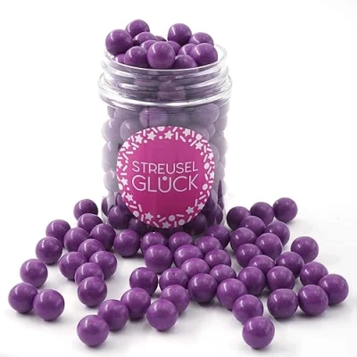 Afbeelding van STREUSEL GLÜCK glitter taartdecoratie in de vorm van paarse chocoladeballen, 90 g, taartdecoratie, verjaardag, Kerstmis, chocoladekralen, eetbare