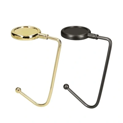 Afbeelding van kwmobile Tassenhaken voor tafel Set van 2 draagbare tashangers Tassenhangers of kast In goud / mat zwart